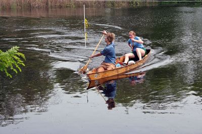 Co-Ed Captains
Helaina Sacco and Peter Sacco, both of Rochester, cross the finish line in the 2007 Memorial Day Boat Race on the Mattapoisett River. The #40 team finished 12th overall and took first place in the Co-Ed Division. (Photo by Robert Chiarito).
