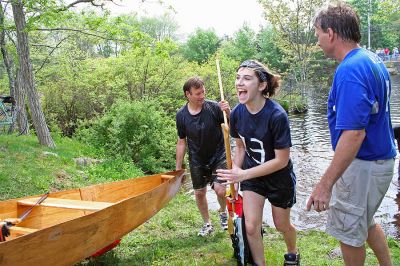 Water Logged
Another team happily exits their boat after making the two-hour-plus trek down the Mattapoisett River in the 2007 Memorial Day Boat Race. (Photo by Robert Chiarito).
