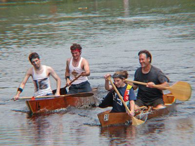 Battle for the Finish
Team #16 (Matthew Lawrence of Rochester and Nicholas Jenkins of East Freetown) battle it out with Team #23 (Chelsea Allen and Terry Allen, both of Acushnet) as they head toward the finish line in the 2007 Memorial Day Boat Race on the Mattapoisett River. (Photo by Kenneth J. Souza).
