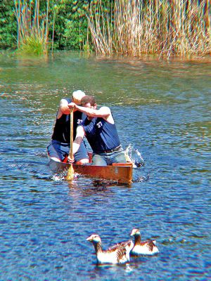 Ducks in a Row
Aristides Papadakis of Rochester and Roland Martin III of West Wareham (Team #37) try to keep up with two unregistered contestants in the 2006 Annual Memorial Day Boat Race on the Mattapoisett River. (Photo by Kenneth J. Souza).
