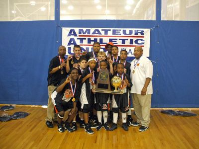 Hoop Dreams
Members of the MABC Championship basketball team, featuring Rochester player Jarred Reuter, pose with their trophy and Coach and MABC Owner Larry Merritt from Dorchester (far right). Jarred scored 12 points, took 15 rebounds and had 3 blocks in the Championship game against Philadelphia.
