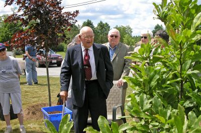 COA Memorial Tree Planting
George Church speaks about his wife, former longtime COA board member Katherine Church, while standing before the tree planted in her memory on the grounds of the Rochester Senior Center. (Photo by Kenneth J. Souza).
