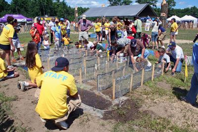 Leap, Frog!
The popular frog races were held on Saturday, August 18 during the annual Rochester Country Fair. (Photo by Robert Chiarito).
