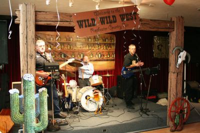 Wild West
Local favorites The Relics performed during the Rochester Country Fair Committees annual Dinner Dance on Saturday, March 1 at Redmans Hall in Wareham. The dinner was a fundraising event aimed at raising money for the Rochester County Fair, to be held this year from August 20 through the 24 at Plumb Corner in Rochester. The theme of this years fair is Rochester Western-Style. (Photo by Robert Chiarito).
