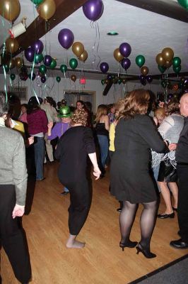 Country Dance
Rochester residents kicked up their heels to the sounds of The Relics on Saturday evening March 7 at the Redman Hall in Wareham as they partied Mardi Gras style at the Rochester Country Fairs Annual Dinner Dance Fundraiser. Mardi Gras will be the theme for this year's Fair that will take place in Rochester in mid August.
