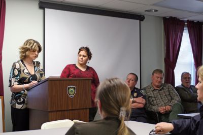 Dispatchers Honored
Rochester Chief Dispatcher Tracy Eldridge presents Dispatcher Tracie Lord with the Outstanding Call of the Year Award during the Third Annual Dispatcher Appreciation Night held at the Rochester Police Station on Monday, April 14 while Police Chief Paul Magee and other town officials look on. Ms. Lord was honored for her superior work in fielding hundreds of calls during a major fire at the SEMASS facility in March of 2007. (Photo by Kenneth J. Souza).

