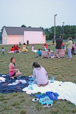 Drive-In Benefit
A benefit Drive-In Movie Fundraiser was held on Saturday night, June 14 at the Dexter Lane Ballfield in Rochester. The special outdoor screening of Disney's movie "Cars" was to benefit the new playground for kids at Dexter Lane. (Photo by Robert Chiarito).


