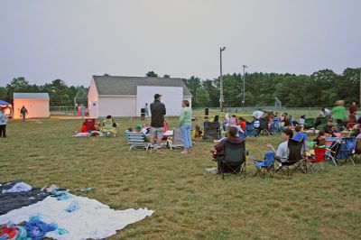 Drive-In Benefit
A benefit Drive-In Movie Fundraiser was held on Saturday night, June 14 at the Dexter Lane Ballfield in Rochester. The special outdoor screening of Disney's movie "Cars" was to benefit the new playground for kids at Dexter Lane. (Photo by Robert Chiarito).

