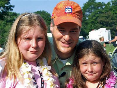 Generous Girls
Rochester siblings, Arissa (11) and Deianeira "Nara" (9) Underhill, seen here flanking FOX 25 personality Doug "VB" Goudie, were featured on the station's Morning News Zip Trip in Middleboro on Friday, August 3, 2007. The sisters were featured for their donation of 375 brand new books to FOX's Reach Out and Read Literacy Foundation Book Drive. This is the second year in a row that the siblings have been featured for their humanitarian/community service efforts. (Photo courtesy of Dawn Underhill).
