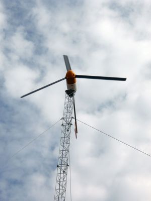 Wind Power
Rochester Golf Course owners Stuart and Judy Tallman have erected a windmill on the course off Route 105 in the hopes of using it to help generate and supply power for the propertys clubhouse. The 80-foot high tower is topped with a 10-kilowatt turbine, which should produce about 20,000 kw of electricity for the Golf Club annually. The Tallmans received a grant through the Massachusetts Technology Collaboration to obtain the windmill. (Photo by Kenneth J. Souza).
