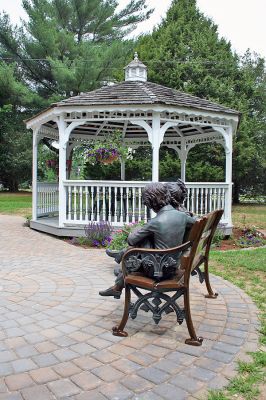 Reading Garden
The Joseph H. Plumb Memorial Library in Rochester recently dedicated a new Reading Garden, an outdoor sculpture garden and sitting area, that was a gift of the family and friends of Steven Santos in his memory on Saturday morning, June 28. (Photo by Robert Chiarito).
