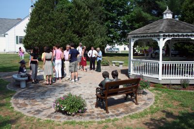 Reading Garden
The Joseph H. Plumb Memorial Library in Rochester recently dedicated a new Reading Garden, an outdoor sculpture garden and sitting area, that was a gift of the family and friends of Steven Santos in his memory on Saturday morning, June 28. (Photo by Robert Chiarito).
