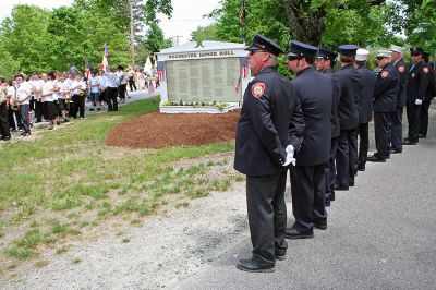 Memorial Day 2007
Members of the Rochester Fire Department stand at attention in uniform in front of a memorial in honor of the town's deceased veterans during Memorial Day Exercises held in Rochester on Sunday, May 27 in the town center. (Photo by Robert Chiarito).
