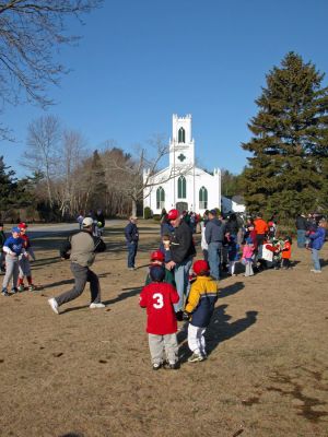 Rochester Opening Day 2007
Members of the Rochester Youth Baseball League (RYB) held their Opening Day Parade and Ceremonies on Saturday, April 14 in the Rochester Town Center. Several hundred youngsters marched from the green in front of the First Congregational Church to their field of dreams, Gifford Park, to mark the opening of the 2007 baseball season. Each of the leagues 20 teams had a place in the parade. (Photo by Robert Chiarito).
