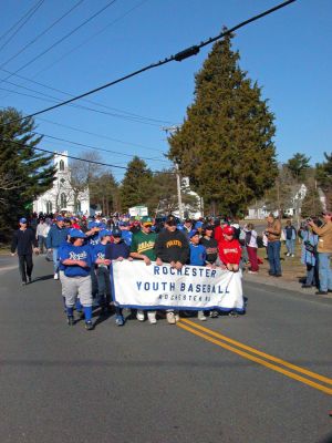 Rochester Opening Day 2007
Members of the Rochester Youth Baseball League (RYB) held their Opening Day Parade and Ceremonies on Saturday, April 14 in the Rochester Town Center. Several hundred youngsters marched from the green in front of the First Congregational Church to their field of dreams, Gifford Park, to mark the opening of the 2007 baseball season. Each of the leagues 20 teams had a place in the parade. (Photo by Robert Chiarito).
