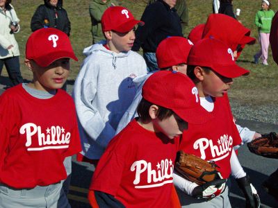 RYB Says 'Play Ball'
Members of the Rochester Youth Baseball League (RYB) held their Opening Day Parade and Ceremonies on Saturday, April 14 in the Rochester Town Center. Several hundred youngsters marched from the green in front of the First Congregational Church to their field of dreams, Gifford Park, to mark the opening of the 2007 baseball season. Each of the leagues 20 teams had a place in the parade. (Photo by Robert Chiarito).
