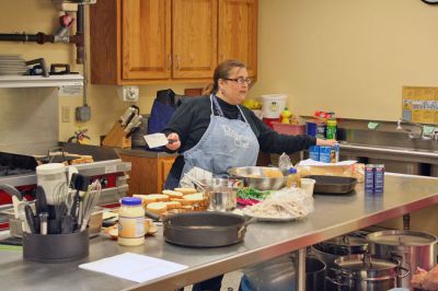 Cooking Class
Rochester's own Pampered Chef Linda Medeiros recently returned to the Rochester Senior Center for another unique presentation. In preparation for Thanksgiving, Ms. Medeiros showed some clever ways to reuse all those turkey dinner leftovers. (Photo by Robert Chiarito).
