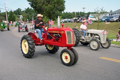 Rochester Country Fair Parade 2007
A line of farming tractors participate in the Rochester Country Fair Parade on Sunday, August 19. (Photo by Robert Chiarito).
