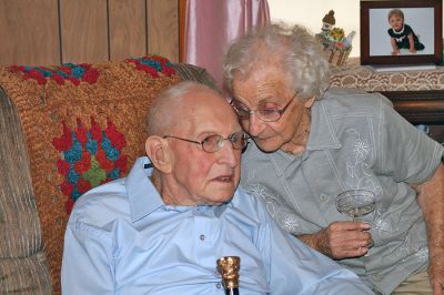 Citizen Cane
Ninety-eight-year-old Chester "Chet" Rollins of Rochester, seen here with his wife Marjorie, recently received the Boston Post cane from the town Selectmen during a presentation ceremony at his home on Friday, December 19. (Photo by Kenneth J. Souza).
