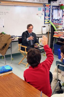 Readers in Rochester
State Representative William Straus reads to students at Rochester's Memorial School during the recent "Reading is Fundamental" guest reader program. (Photo by Robert Chiarito).
