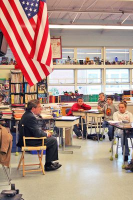 Readers in Rochester
State Representative William Straus reads to students at Rochester's Memorial School during the recent "Reading is Fundamental" guest reader program. (Photo by Robert Chiarito).
