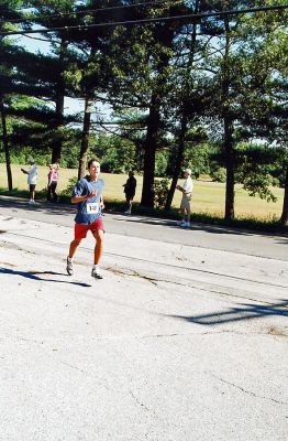 Rochester 5K Road Race 2007
Jared Dourdeville of Marion placed fourth crossing the finish line in 17:31 in the Second Annual Rochester 5K Road Race held on Saturday, August 11. (Photo by Deborah Silva).
