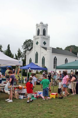 Rochester Rummage
The First Congregational Church of Rochester held their annual outdoor Rummage Sale on the Town Green in Rochester Center on Saturday, August 30. The event drew a sizeable crowd of potential customers looking for great items at bargain prices. (Photo by Robert Chiarito).
