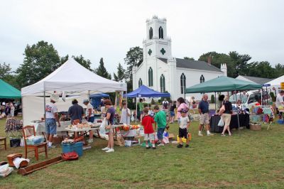 Rochester Rummage
The First Congregational Church of Rochester held their annual outdoor Rummage Sale on the Town Green in Rochester Center on Saturday, August 30. The event drew a sizeable crowd of potential customers looking for great items at bargain prices. (Photo by Robert Chiarito).
