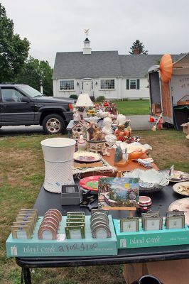 Rochester Rummage
The First Congregational Church of Rochester held their annual outdoor Rummage Sale on the Town Green in Rochester Center on Saturday, August 30. The event drew a sizeable crowd of potential customers looking for great items at bargain prices. (Photo by Robert Chiarito).
