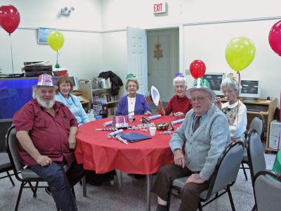 Rochester Rings in New Year
New Years Eve came early as the Rochester Council on Aging (COA) hosted their First Annual New Years Eve Party at the Rochester Senior Center on Friday, December 29. The revelers who attended the party were treated to everything one would expect in a New Years celebration. The occaision included music, bubbling drinks, streamers, party hats and a balloon drop and, there was even a master of ceremonies answering to the name Dick Clark! (Photo by Robert Chiarito).
