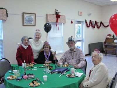 Rochester Rings in New Year
New Years Eve came early as the Rochester Council on Aging (COA) hosted their First Annual New Years Eve Party at the Rochester Senior Center on Friday, December 29. The revelers who attended the party were treated to everything one would expect in a New Years celebration. The occaision included music, bubbling drinks, streamers, party hats and a balloon drop and, there was even a master of ceremonies answering to the name Dick Clark! (Photo by Robert Chiarito).

