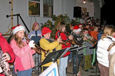 Making Merry Music
Members of the Rochester Memorial School Band perform holiday classics during the 2006 Annual Tree Lighting Ceremony held at the Rochester Town Hall on Monday, December 11. (Photo by Kenneth J. Souza).
