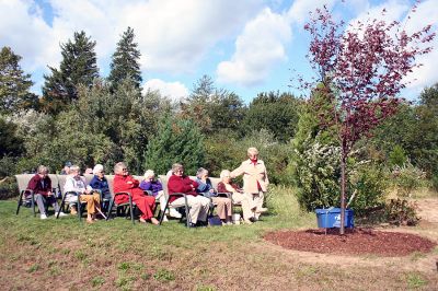 Branching Out
Members of the Rochester Council on Aging (COA) dedicated a tree outside the Senior Center in memory of longtime COA member Marie McCarthy on October 3. (Photo by Robert Chiarito.)


