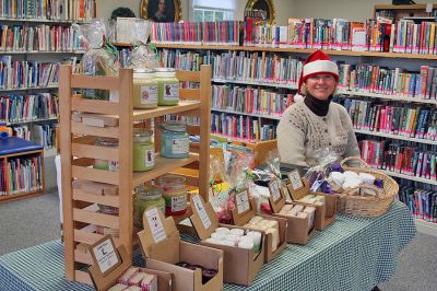 Rochester Village Christmas
Volunteer Rosalyn Braza greeted visitors at the Plumb Memorial Library in Rochester during Rochester's Village Christmas held on the weekend of December 6-7, 2008. (Photo by Robert Chiarito).
