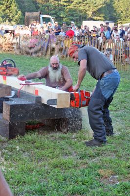 Wood, If I Could
The ever-popular Woodsman Show remains a highlight of Rochesters annual Country Fair and was held on Friday evening, August 22. Here a contestant displays his skills at the difficult and sometimes dangerous axe-throwing competition. Other events included log rolling, bow sawing, disc stacking, spring board chop, two-person cross cut, chainsaw cutting, and downward chop. Some of the woodmen came from as far away as Vermont to compete in this years program. (Photo by Robert Chiarito).
