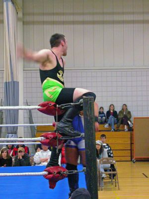 Wrestling in Rochester
Members of the Northeast Championship Wrestling League (NCW) held a series of wrestling matchups in the gymnasium of Rochesters Memorial School on Saturday, April 14 on the occasion of their tenth anniversary to stage a Reunion of NCW to benefit the family of RMS science teacher Tom Kinsky. Mr. Kinsky and his family lost their Wareham home to fire on the night of February 25, which left the family in need of virtually all necessities. (Photo by Robert Chiarito).
