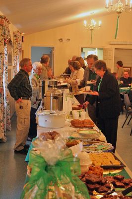 Going Green
The Rev. Dr. Leo Christian welcomed members of his congregation and friends from the surrounding community to the First Congregagtional Church of Rochester's annual St. Patrick's Day Corned Beef Dinner on Saturday , March 14. The diners were fed a hearty meal of corned beef, cabbage and all of the trimmings while being entertained by the father daughter team of of Tiffany and Bronie Rozenaz.
