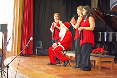 Seasonal Singing
Local favorites The Showstoppers performed Christmas classics during their Holiday Concert on Sunday, December 23 at the Marion Music Hall. (Photo by Robert Chiarito).
