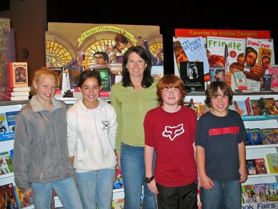 Sippican School Book Fair
Sippican School in Marion recently held its third annual book fair to benefit the sixth grade class and their upcoming spring trip to the White Mountains in New Hampshire, known as The Wilderness Classroom. Pictured here (l. to r.) are Sophie Harding, Hannah Walsh, coordinator Aimee Fox, Brian Fox, and TJ Lee. (Photo by Nancy MacKenzie).
