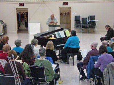 Sippican Spring
Members of the Sippican Choral Society have resumed rehearsals under the guidance of director Brian Roderick in Reynard Hall of the Mattapoisett Congregational Church on Monday evenings from 7:30 to 9:30 pm. The 90-member group is preparing for their spring concert which will take place on April 29 in Wickenden Chapel at Tabor Academy in Marion. (Photo by Robert Chiarito).
