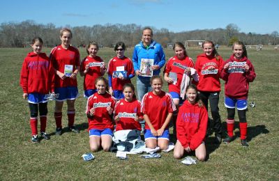 Kick It Out
Stacey Bishop of the Boston Breakers soccer club poses with members of the Mariners Youth Soccer team and a copy of the Wandererthis past weekend in Fairhaven. Pictured are; Back row: L  R: Syd Blanchard, Morgan Browning, Kristen Fuller, Caroline Downey Stacey Bishop, Nicole Gifford, Camille Filloramo and Emily Beaulieu. Front Row L  R: Bailey Truesdale, Arden Goguen, Kaleigh Goulart and Sam Blanchard.
