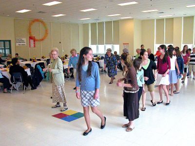 Senior Spring Fling
Seniors from Mattapoisett, Marion and Rochester participated in the eighth annual Spring Fling dance party on Sunday, May 6 in the Sippican School cafeteria. The event was hosted by the Marion Council on Aging (COA) with a group of student volunteers from Old Rochester Regional Junior High School, who not only helped serve refreshments, but also joined their elders on the dance floor for some contemporary and traditional dances. (Photo by Robert Chiarito).
