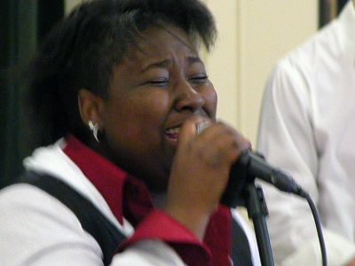 Swazi Aid Show
R&B singer Joy and her band performed during the first in a series of local benefit concerts at the Mattapoisett Congregational Church on Sunday, April 29. The show was organized by Mattapoisett resident and ORR graduate Sarah DeMatos who is attempting to raise money and awareness for abandoned children in Africa. (Photo by Robert Chiarito).
