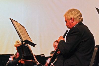 Super Symphony
Members of the Tri-County Sumphonictake a bowduring their Grainger, Gershwin and Gregson concert at the Gilbert D. Bristol Auditorium at Old Rochester Regional High School on Sunday afternoon February 1. (Photo by Robert Chiarito).
