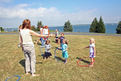 Tri-Town Teddy Bears
Children enjoyed fun in the sun during the Tri-Town Early Childhood Councils Teddy Bear Picnic held on Saturday, September 22 at the scenic Great Hill Farm in Marion. The event, designed to introduce parents to the areas early childhood programs, was held on the lawn of a castle-like mansion overlooking Buzzards Bay. (Photo by Robert Chiarito).
