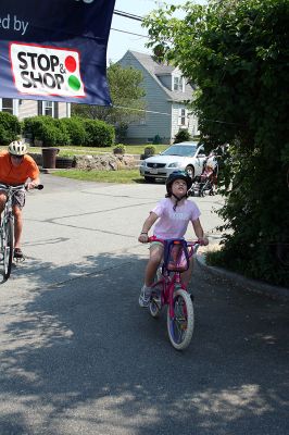 Tri-Town Bikers
The second annual Pan Mass Challenge (PMC) Tri-Town Ride for Kids was held on Saturday, June 14 in Mattapoisett with bikers of all ages rolling across the finish line at Center School. Proceeds from the Tri-Town Ride will benefit the Pan-Mass Challenge, which supports cancer research and treatment at Dana-Farber Cancer Institute through its Jimmy Fund. (Photo by Robert Chiarito).
