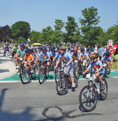 Tri-Town Bikers
The second annual Pan Mass Challenge (PMC) Tri-Town Ride for Kids was held on Saturday, June 14 in Mattapoisett with bikers of all ages rolling across the finish line at Center School. Proceeds from the Tri-Town Ride will benefit the Pan-Mass Challenge, which supports cancer research and treatment at Dana-Farber Cancer Institute through its Jimmy Fund. (Photo by Robert Chiarito).
