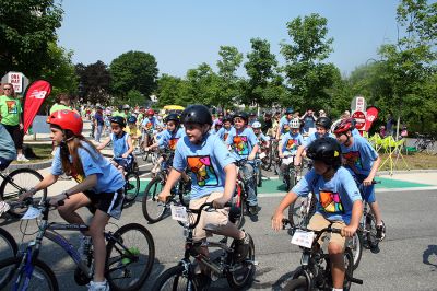 Tri-Town Bikers
The second annual Pan Mass Challenge (PMC) Tri-Town Ride for Kids was held on Saturday, June 14 in Mattapoisett with bikers of all ages rolling across the finish line at Center School. Proceeds from the Tri-Town Ride will benefit the Pan-Mass Challenge, which supports cancer research and treatment at Dana-Farber Cancer Institute through its Jimmy Fund. (Photo by Robert Chiarito).
