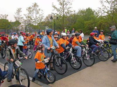 Tri-Town Bike Benefit
Several hundred children and their parents braved soggy conditions to participate in the first annual Pan-Mass Challenge (PMC) Tri-Town Ride for Kids on Saturday, May 19 starting at Center School on Barstow Street in Mattapoisett. The young bikers arrived with the goal of pedaling their way towards raising $10,000 in the fight to find a cure for cancer. Children ranging in age from 3 to 15 years were encouraged to participate in the bike rally benefit. (Photo by Robert Chiarito).
