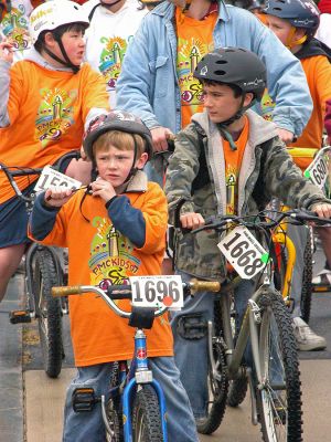 Tri-Town Bike Benefit
Several hundred children and their parents braved soggy conditions to participate in the first annual Pan-Mass Challenge (PMC) Tri-Town Ride for Kids on Saturday, May 19 starting at Center School on Barstow Street in Mattapoisett. The young bikers arrived with the goal of pedaling their way towards raising $10,000 in the fight to find a cure for cancer. Children ranging in age from 3 to 15 years were encouraged to participate in the bike rally benefit. (Photo by Robert Chiarito).
